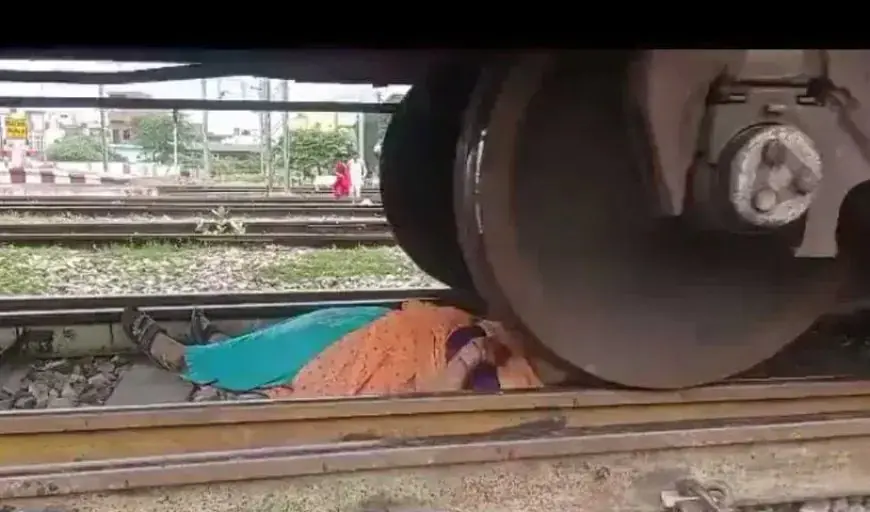 महिला ने बिना पीछे देखे रेल पटरी पार करने की कोशिश की